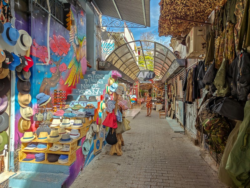Why to stay in Monastiraki - Colorful alley in Monastiraki Flea Market area — one of the best places to stay in Athens for easy access to shopping, culture, and the Acropolis.