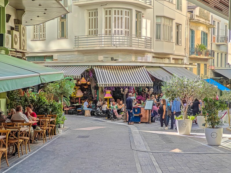 Where to stay in Syntagma - Bustling street scene near Syntagma Square in Athens — a top choice for travelers looking to stay in the city’s most central and well-connected area.